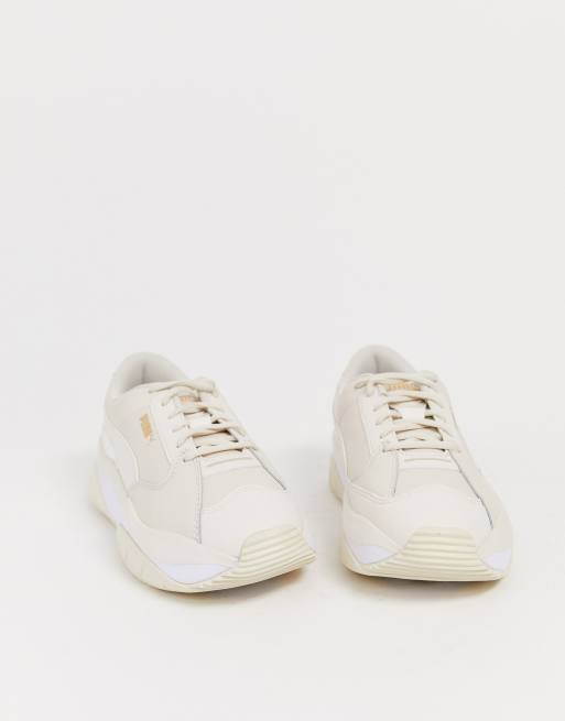 Puma Storm.y Trainers in Beige ASOS