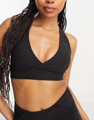 Puma Studio Yoga bra in black - ASOS Price Checker