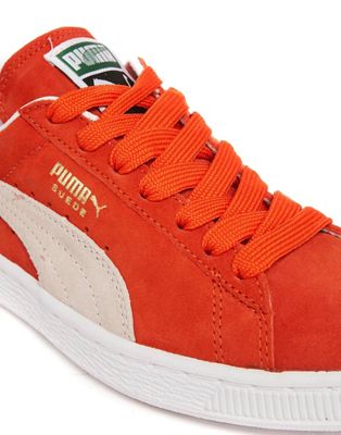 orange puma trainers