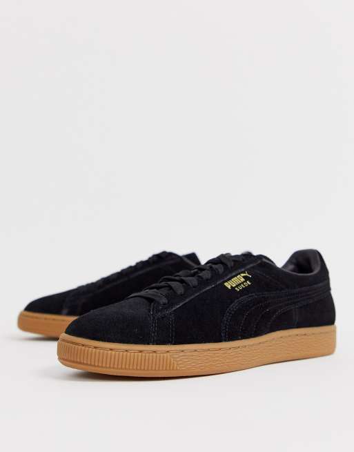 Puma suede hot sale black sole