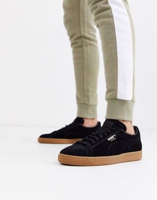 Puma Suede trainers in black with gum 