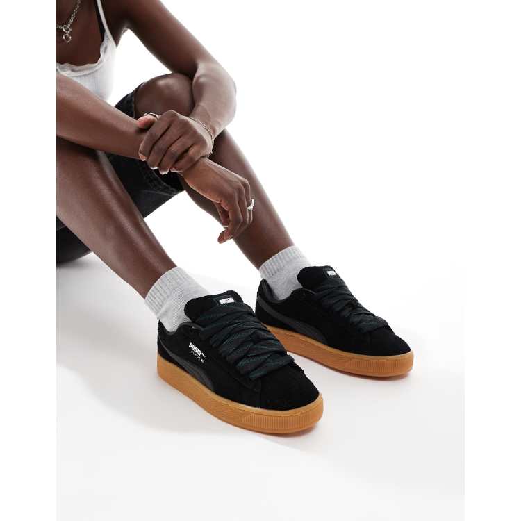 PUMA Suede XL sneakers in black with gum sole