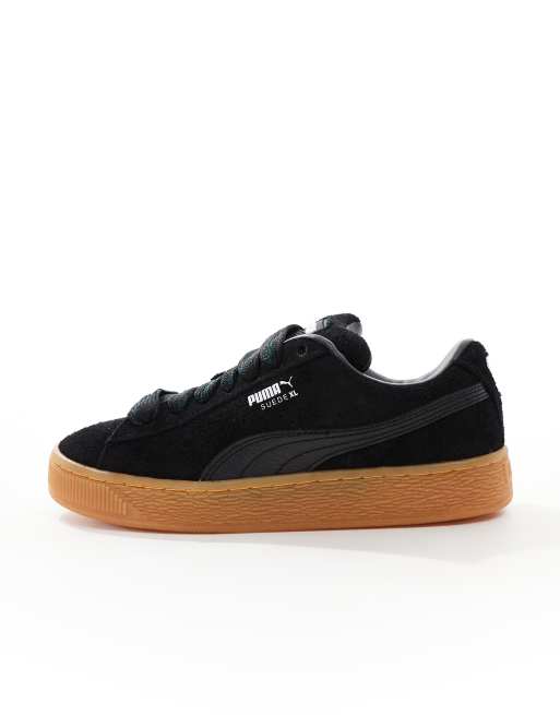 PUMA Suede XL sneakers in black with gum sole