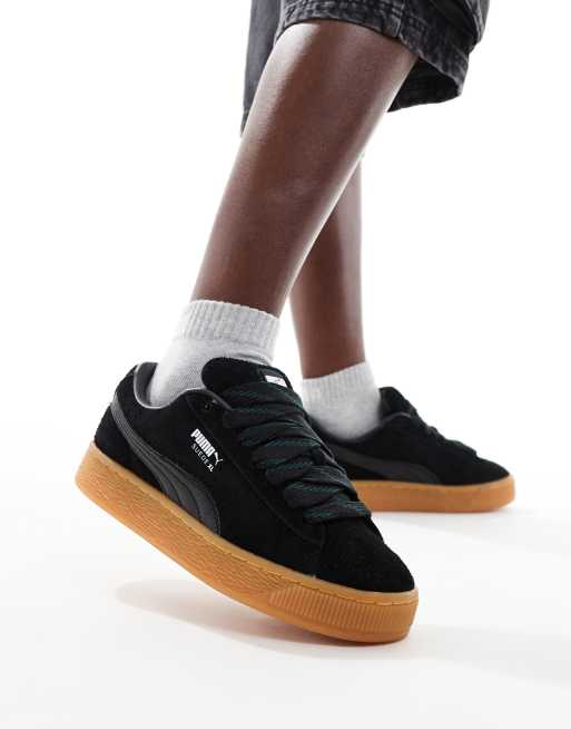 PUMA Suede XL sneakers in black with gum sole