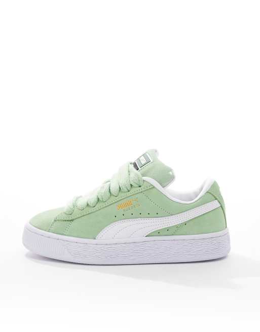 PUMA Suede XL sneakers in green and white