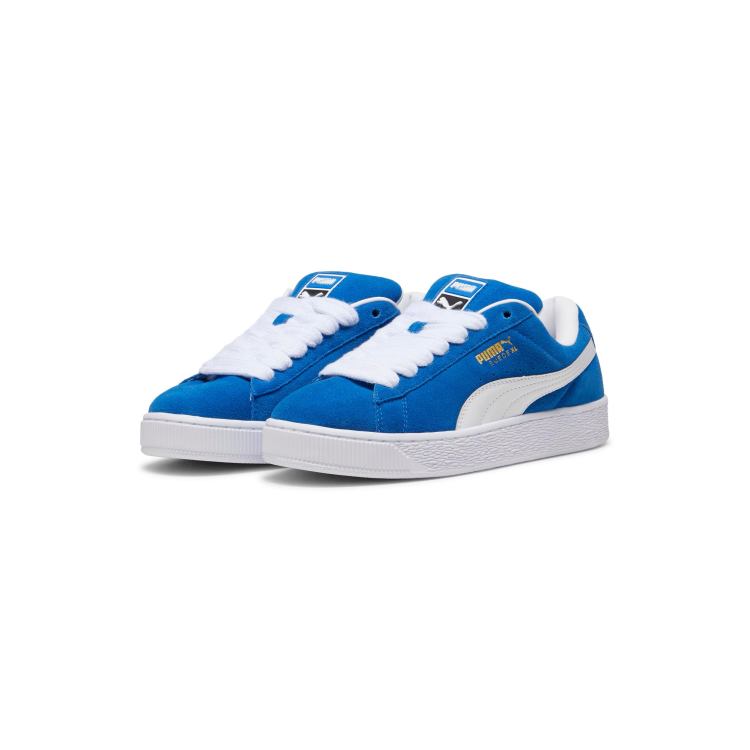 Puma Suede XL trainers in blue and white