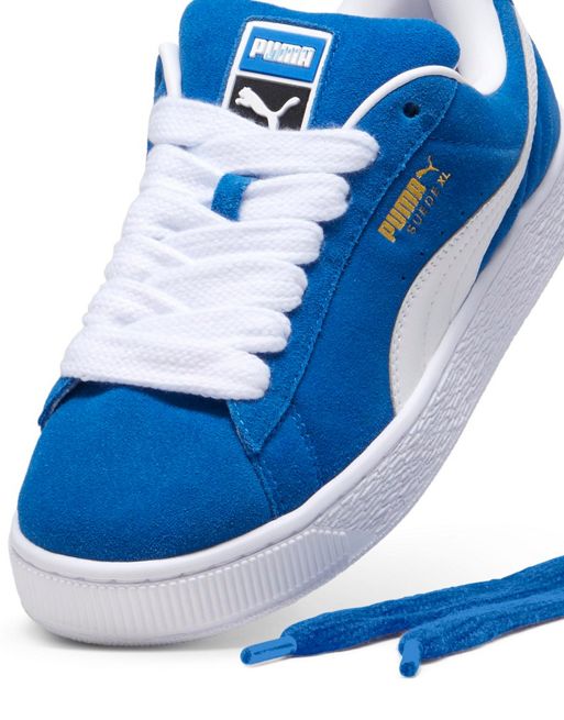 Puma Suede XL trainers in blue and white