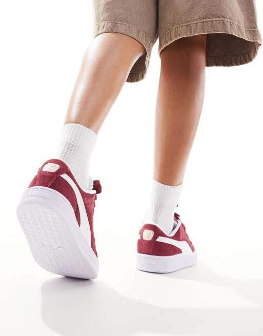 Burgundy and white pumas on sale