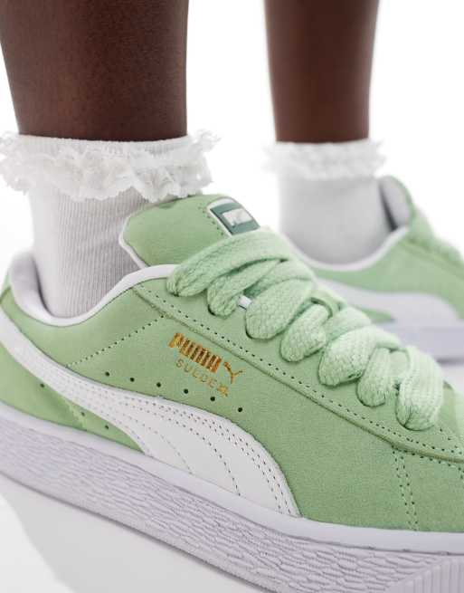 Puma Suede XL trainers in green and white