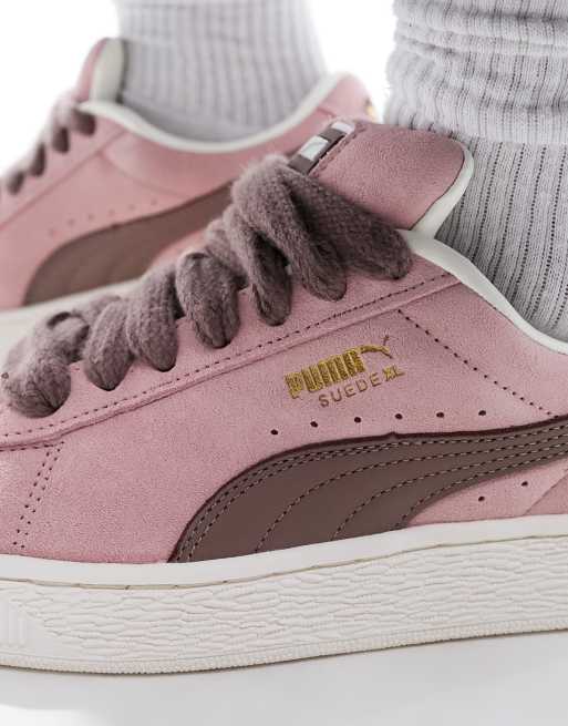 Pink suede pumas women's online