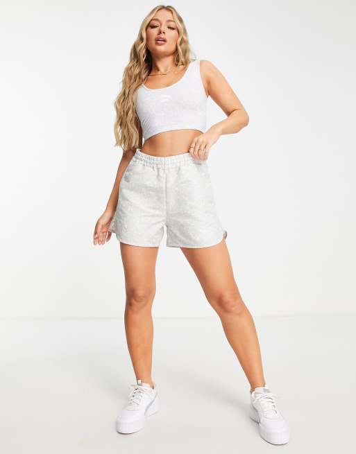 PUMA summer resort shorts in blue floral print