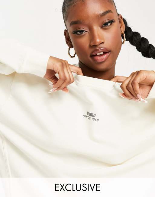 PUMA - Sweatshirt in gebroken wit