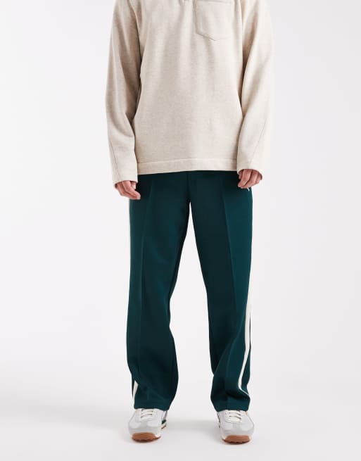 Puma T7 always on relaxed track pants in green terrain-alpine snow
