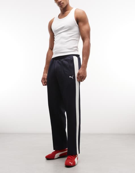 Puma T7 always on relaxed track pants in navy - view 1