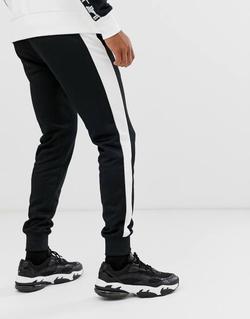 Puma joggers hot sale white stripe