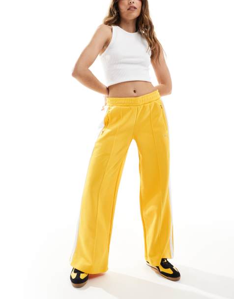 Puma T7 low rise track trousers in yellow