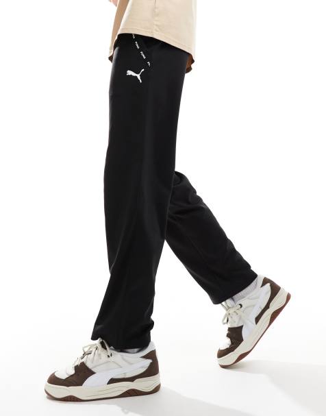 Puma Taped PWRFleece Lite joggers in black - view 1