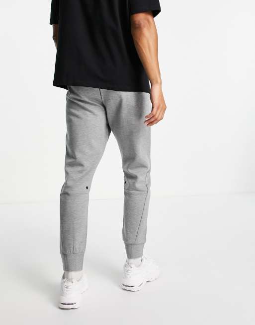 Puma tech zip through joggers in grey ASOS