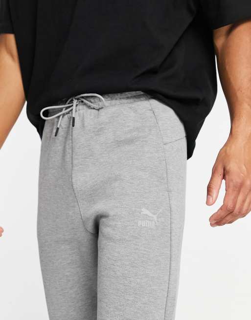 Puma joggers with zip pockets sales