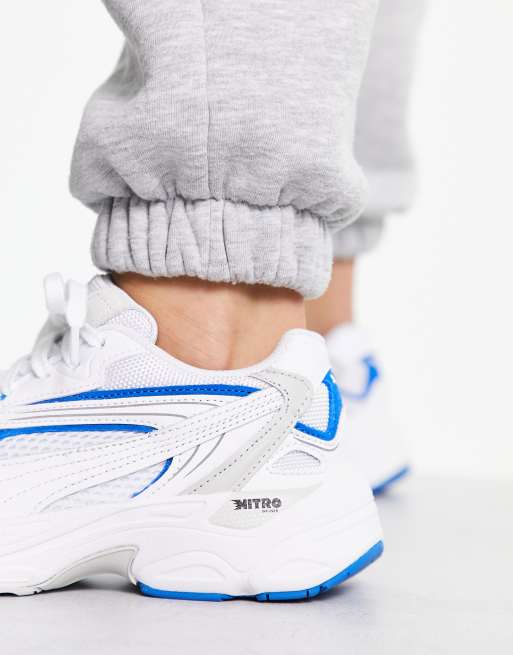 PUMA Teveris Nitro Base sneakers in white/blue