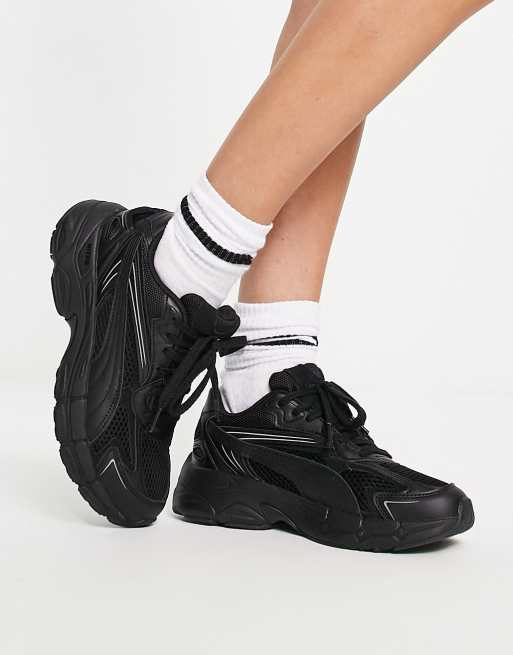 Puma Teveris Nitro trainers in black and silver