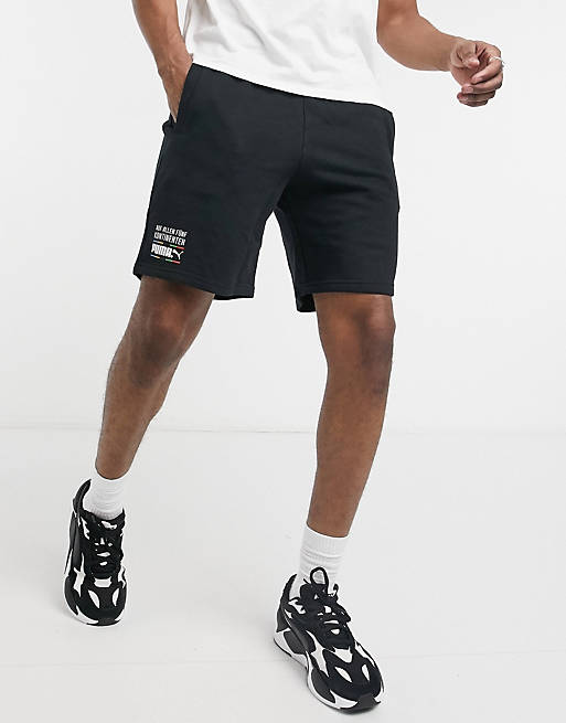 Men Puma TFS Unity metallic logo shorts in black 