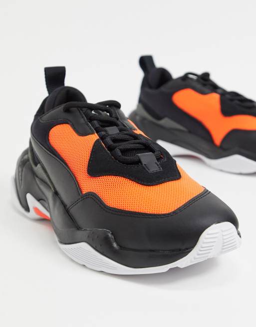 Puma Thunder 2.0 sneakers in black and red