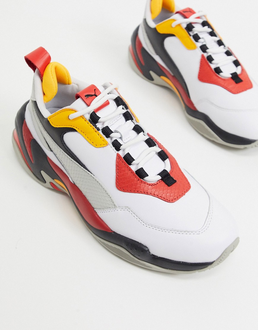 Puma Thunder sneakers in white and red