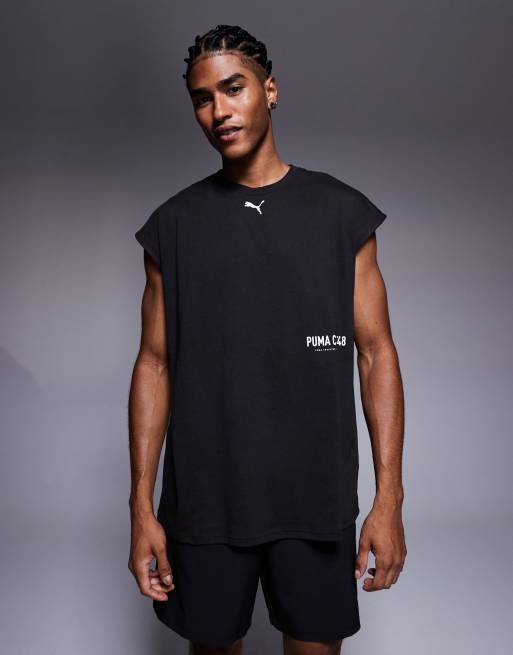 PUMA - Top senza maniche nero da allenamento con grafica sul retro e bordi tagliati, 2 di 5
