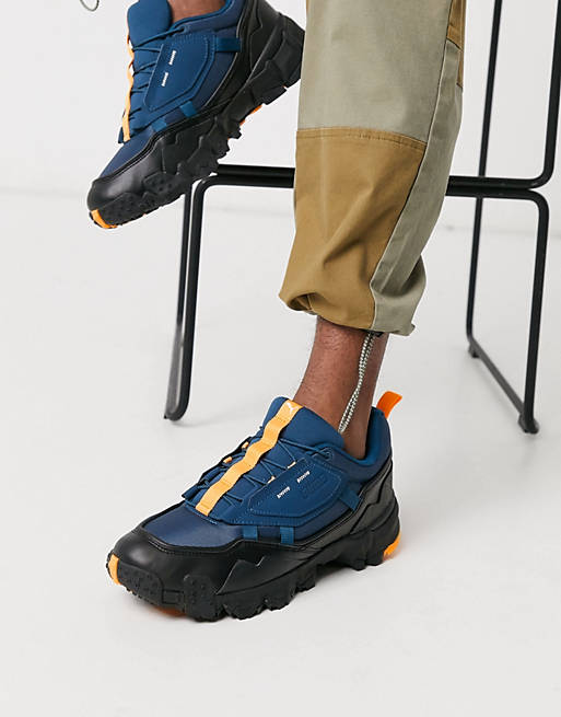 Engrave Arabic scan Puma Trailfox Overland sneakers in blue | ASOS