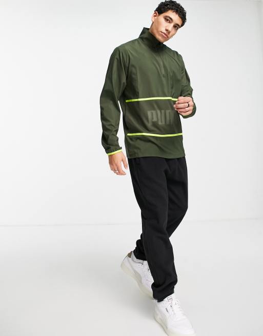 Puma train graphic woven 1/2 zip jacket in khaki