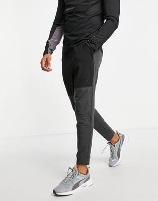 Puma Training Cloudspun Protect joggers in black and gray