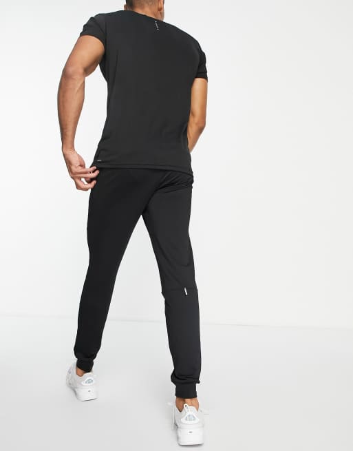 Puma Training cuffed joggers in black