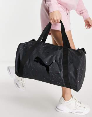 Puma Training Essential barrel bag in black sparkle