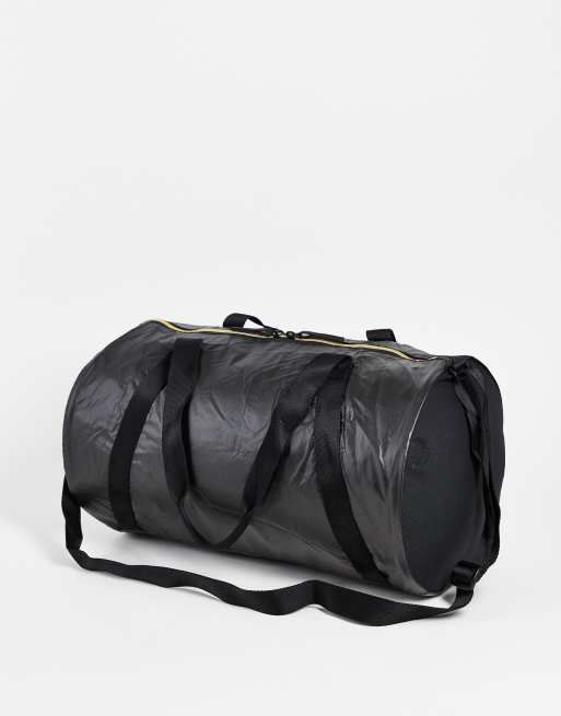 Puma Training Essentials Sac de sport Noir et or rose ASOS