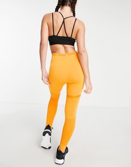 PUMA Training Evoknit seamless leggings in orange