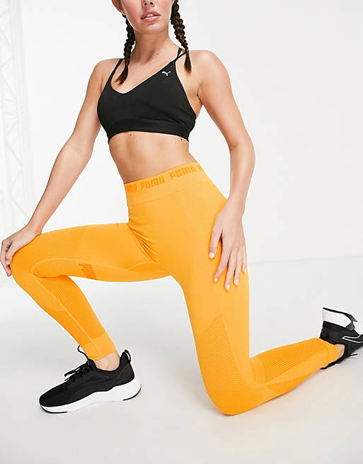 Women Puma Training Evoknit seamless leggings in orange 