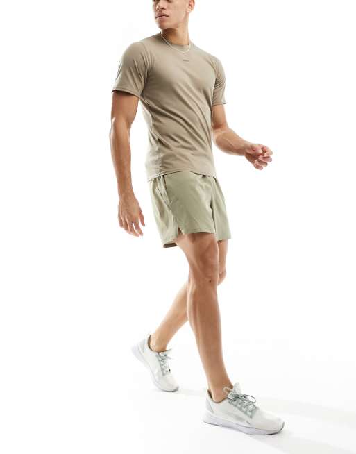 PUMA Training Evolve woven shorts in beige ASOS