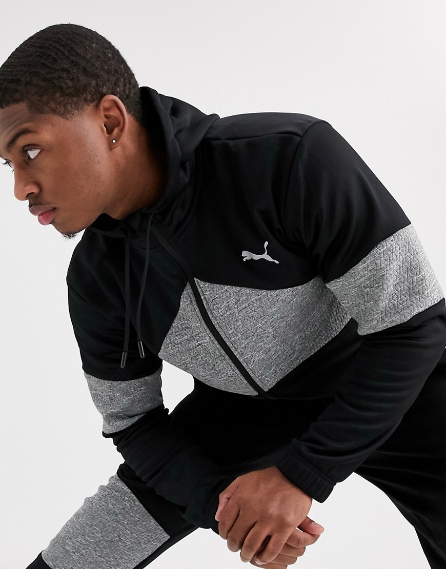 Puma Training Extract zip-up hoodie in black with quilted panels