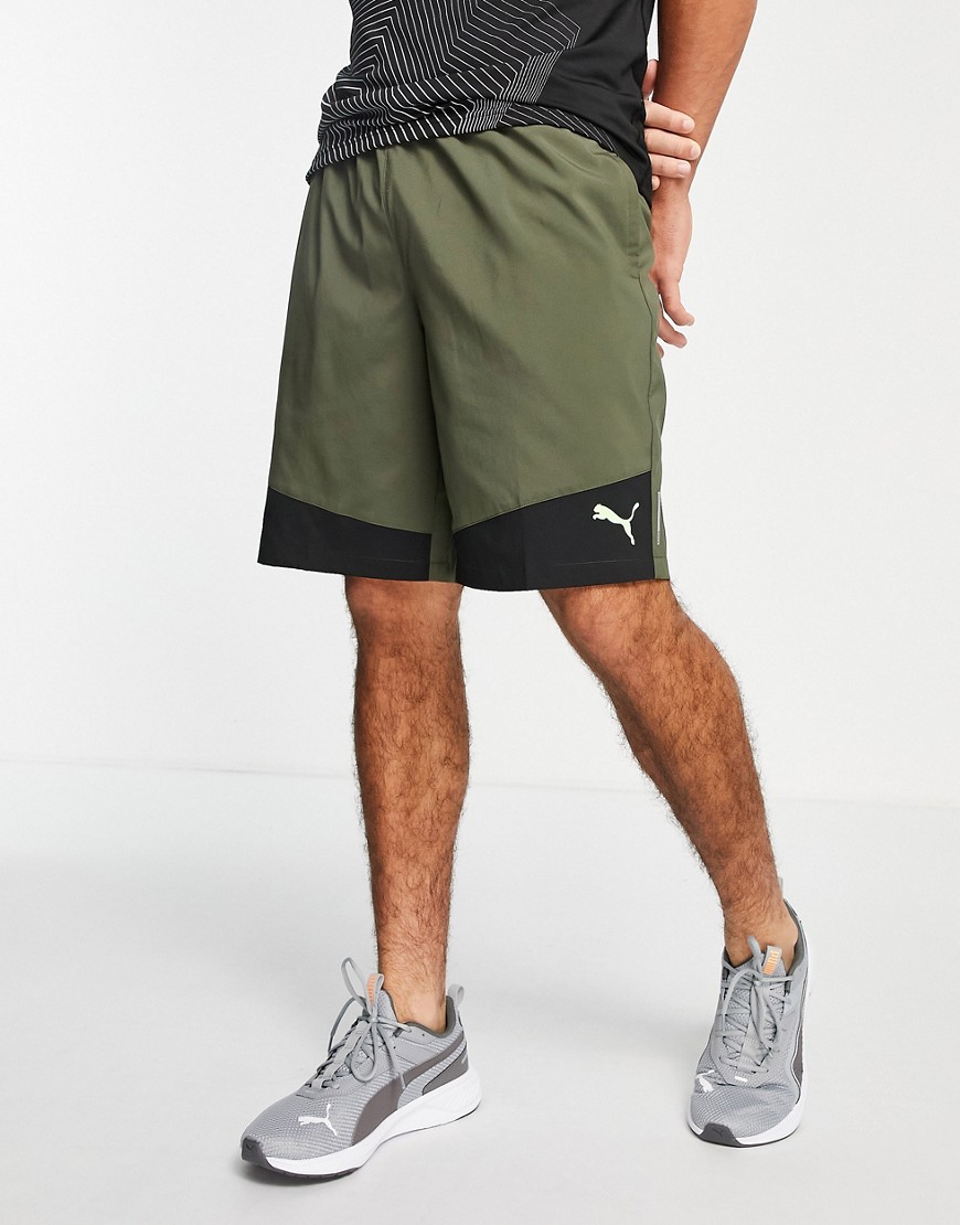 Puma Training Favorite woven 10 inch shorts in olive and black-Green
