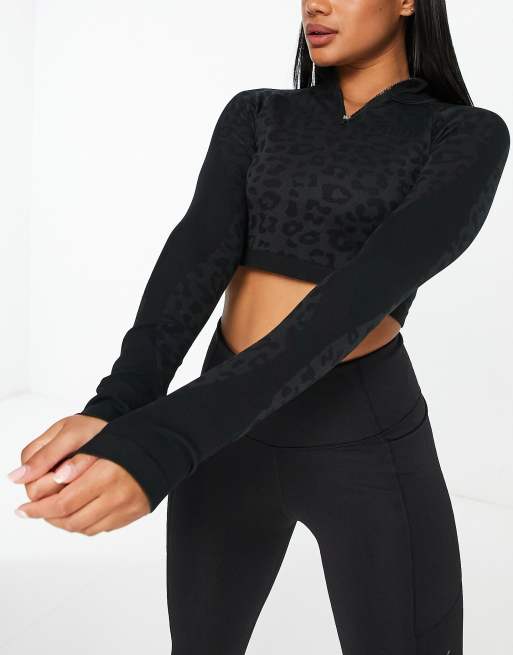 PUMA Training Formknit seamless 1/4 zip top in black leopard print