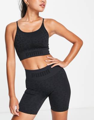 Puma Training formknit seamless low support longline sports bra in black leopard print - ASOS Price Checker