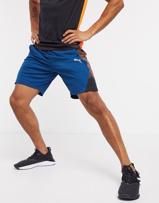 Puma Training graphic shorts in blue and gold