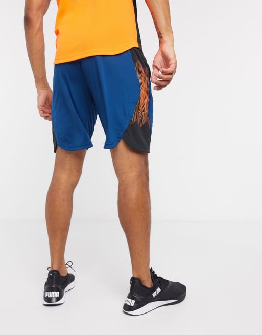 Puma track store shorts gold