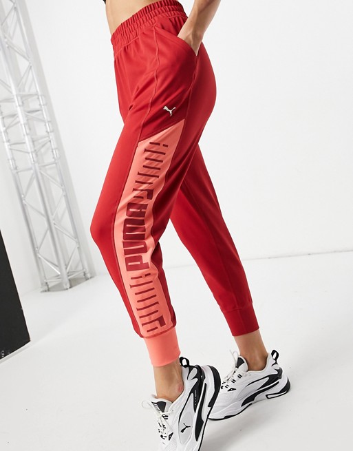 Puma Training joggers in pink with red panels & cream logo exclusive to ASOS