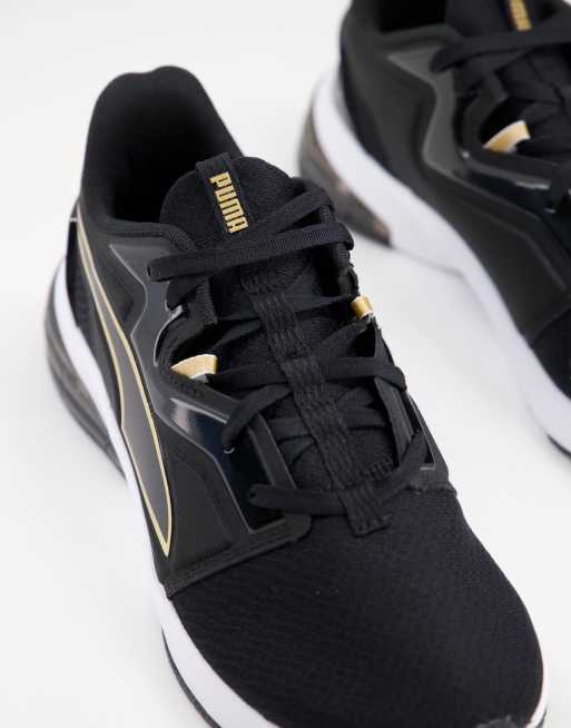 Puma noir cheap et doré