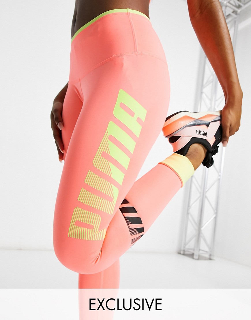 Puma Training modern sport leggings in peach with vertical logo-Orange