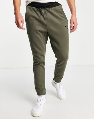 Puma Training muscle fit joggers in black and dark green | ASOS