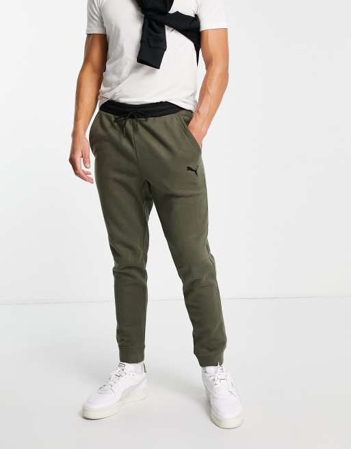 Puma Training muscle fit joggers in black and dark green