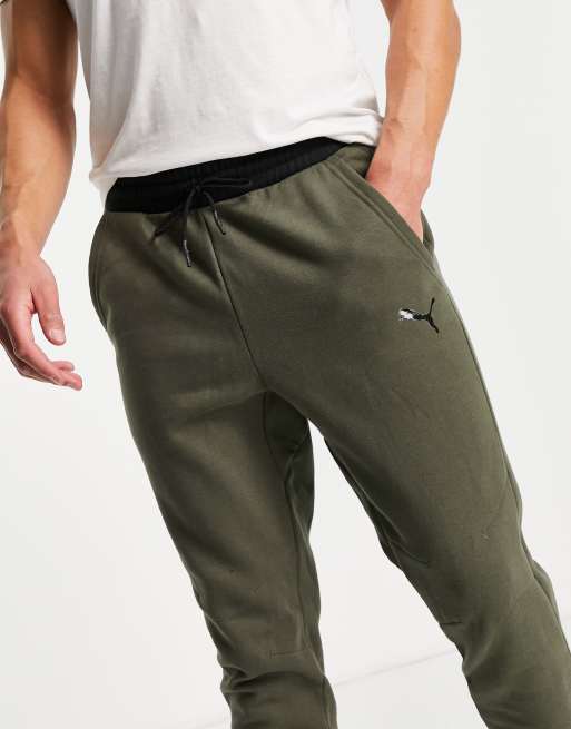 Puma Training muscle fit joggers in black and dark green
